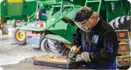 Podolinsky service technician working on equipment