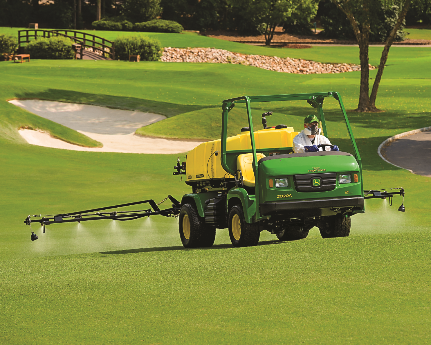 John Deere HD300 turf sprayer working on a golf course
